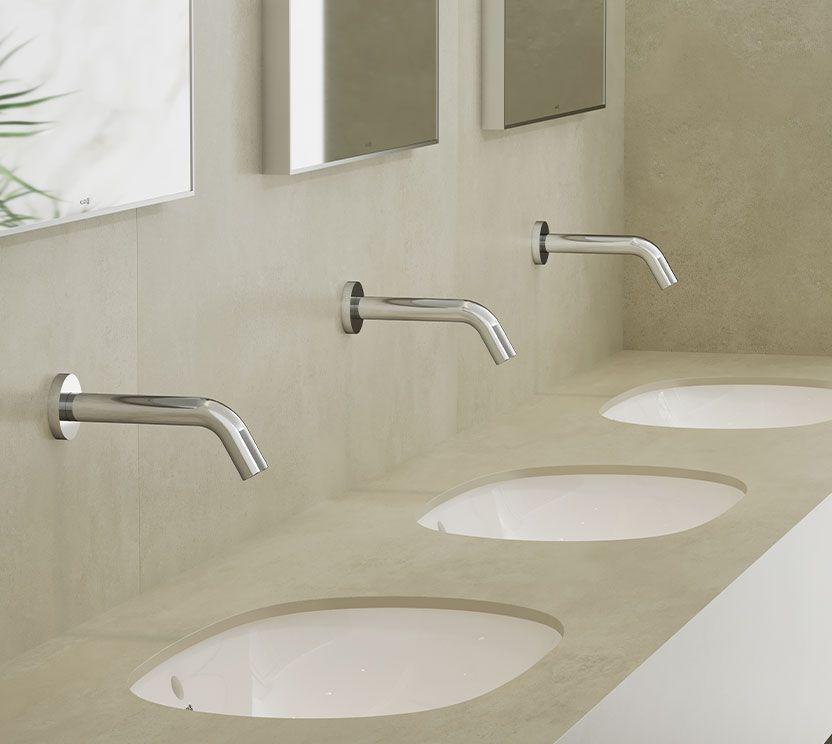 The seamless design of KLUDI-WAVE sensor-operated fixtures contributes to a more sanitary environment, improving overall cleanliness. With growing emphasis on health and safety, sensor-based faucets and dispensers are now a standard in many public facilities. Provided with laser or IR sensor activation, KLUDI-WAVE products are available for wall or deck applications. The faucet features a sleek, slim design with a concealed sensor for a touchless, modern water experience.
